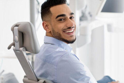 A person sitting on dental clinic