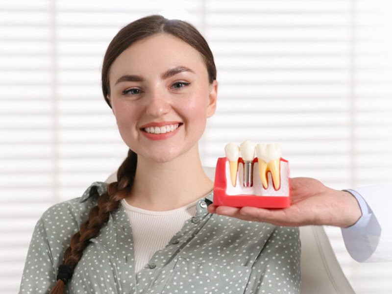 Happy women smiling after dental surgery